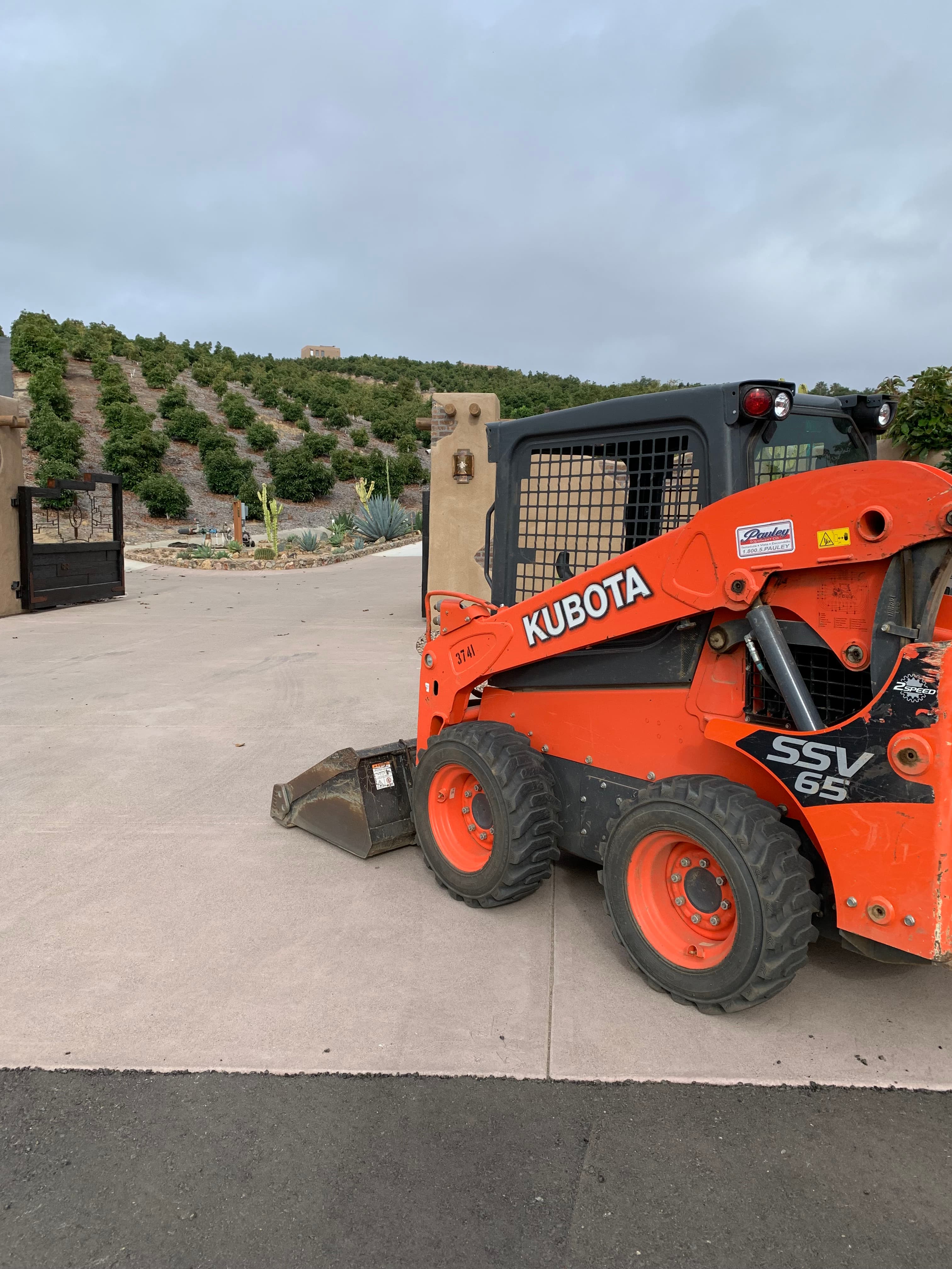 TDM Kubota skid steer loader on construction site